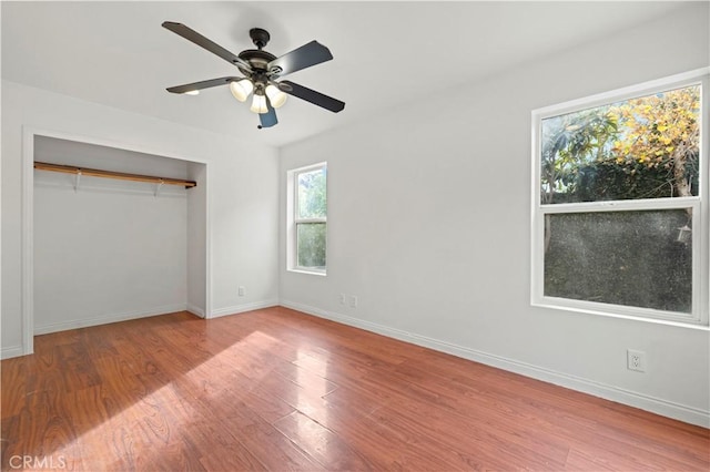 unfurnished bedroom featuring a closet, ceiling fan, and light hardwood / wood-style floors