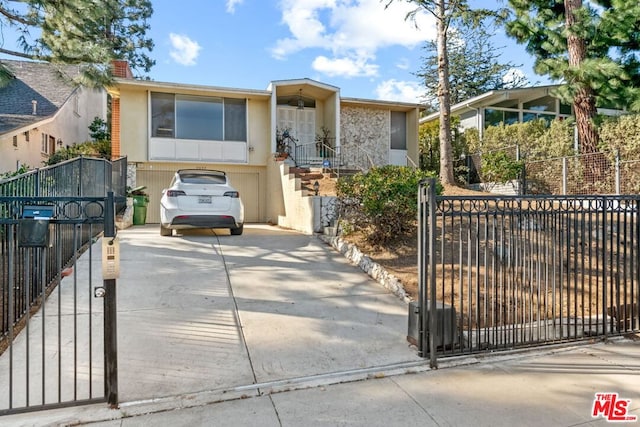 view of front of property with a garage