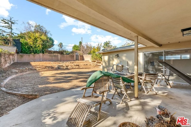 view of patio featuring a playground