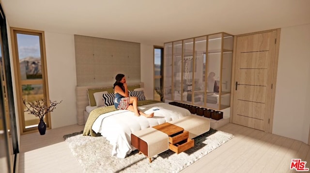 bedroom featuring light hardwood / wood-style flooring