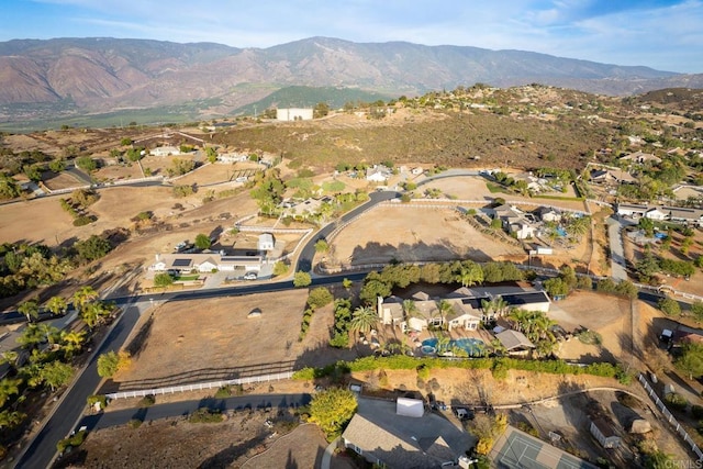 drone / aerial view featuring a mountain view