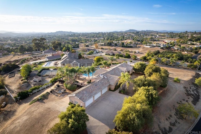 drone / aerial view featuring a mountain view