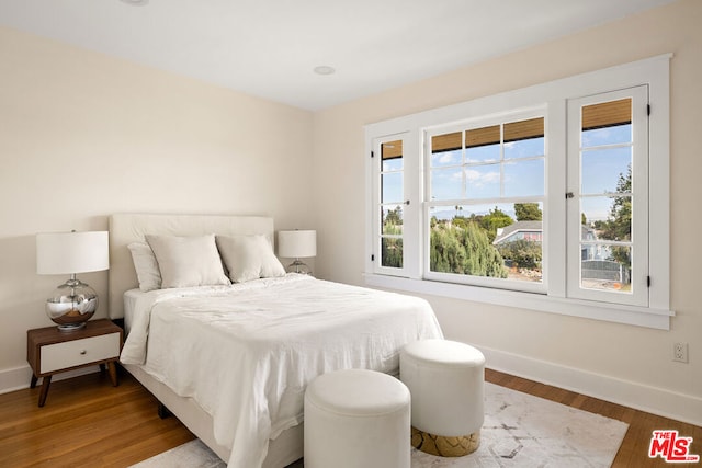 bedroom featuring hardwood / wood-style flooring