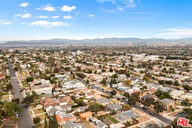 drone / aerial view featuring a mountain view