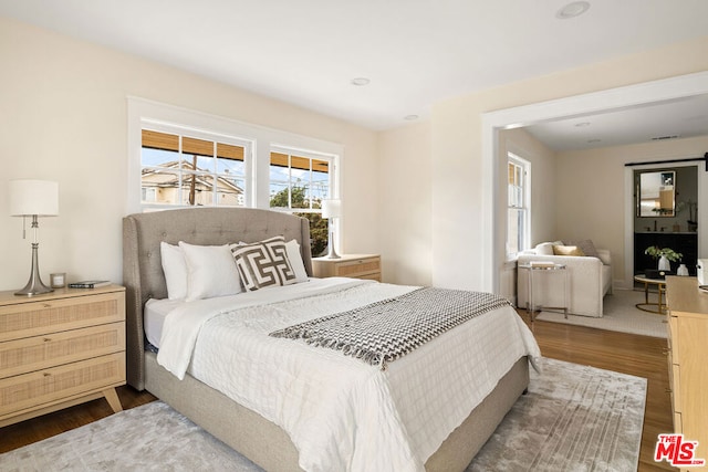 bedroom featuring hardwood / wood-style floors