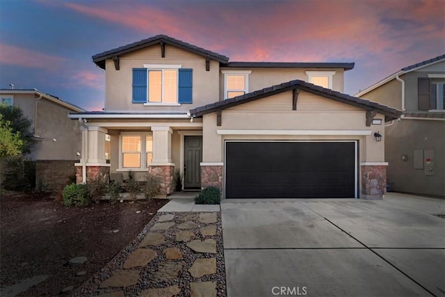 view of front of home featuring a garage