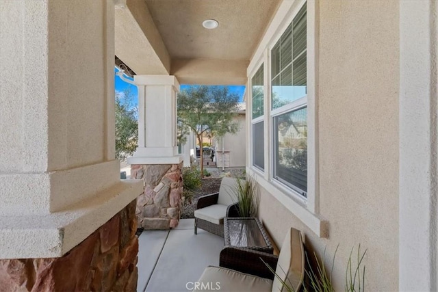 view of patio featuring a porch