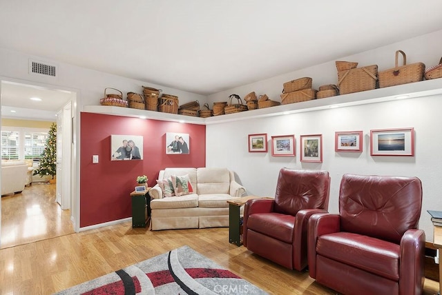 interior space featuring visible vents and light wood-style floors