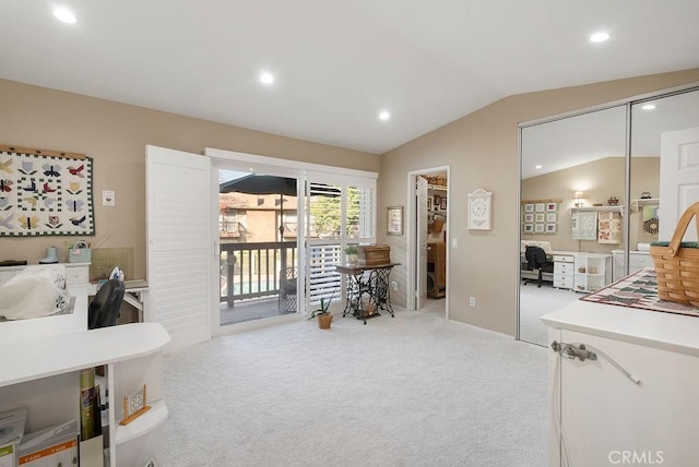 interior space featuring vaulted ceiling, carpet flooring, and recessed lighting