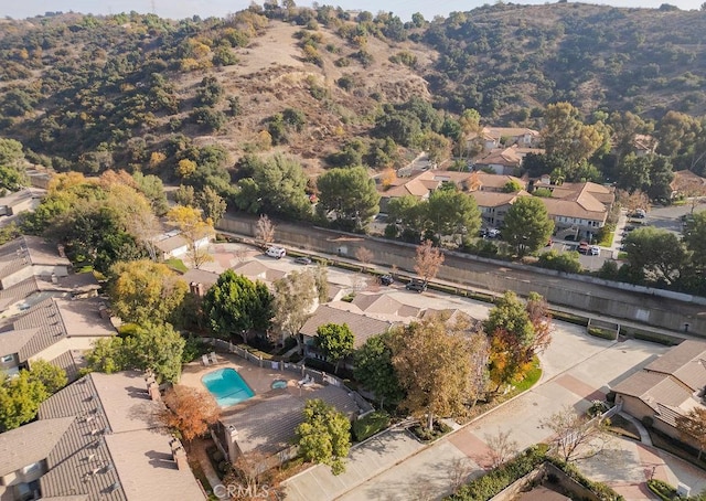 birds eye view of property with a residential view