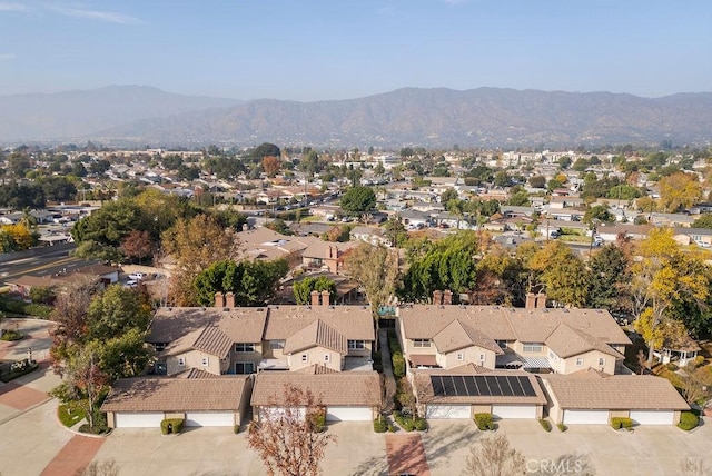 drone / aerial view with a residential view and a mountain view