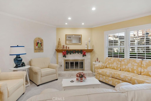 living area with carpet floors, recessed lighting, a glass covered fireplace, and crown molding