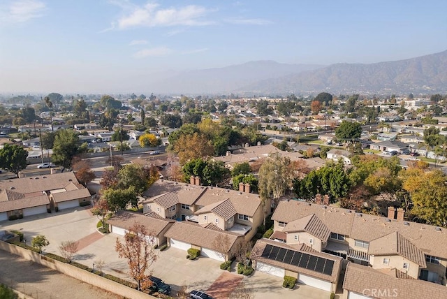 aerial view with a mountain view and a residential view