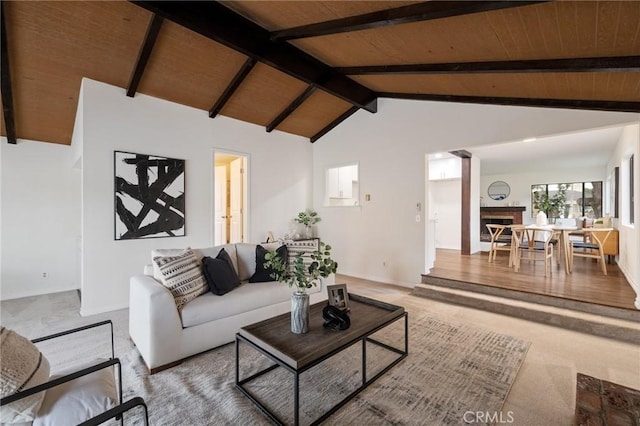 living room with vaulted ceiling with beams, wooden ceiling, and wood-type flooring