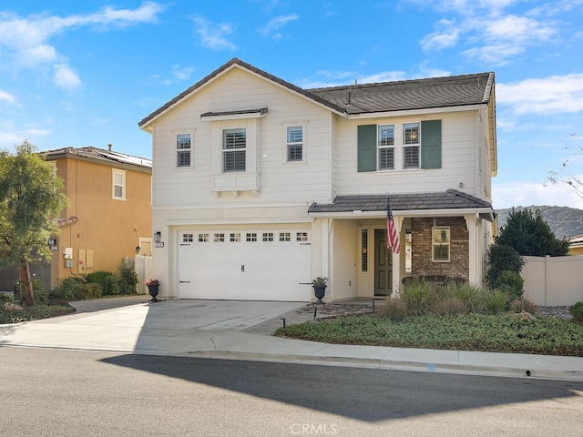 front of property featuring a garage