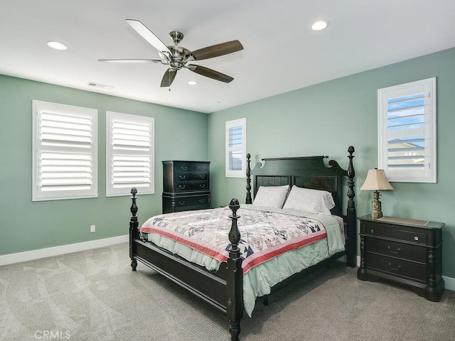 carpeted bedroom with ceiling fan