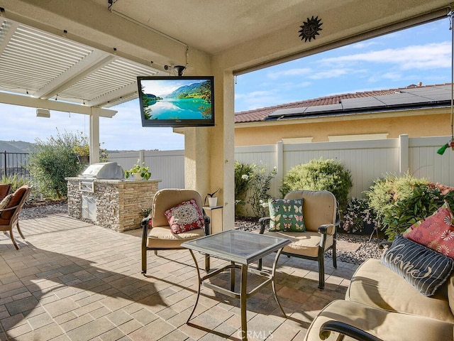 view of patio / terrace with an outdoor living space, area for grilling, a pergola, and grilling area