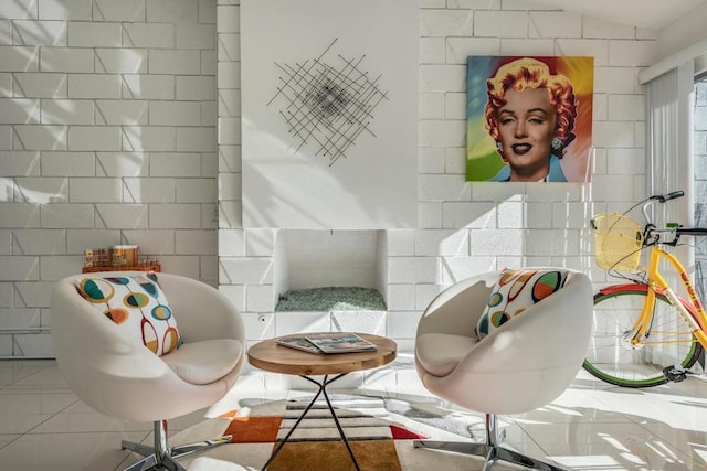 living area featuring vaulted ceiling