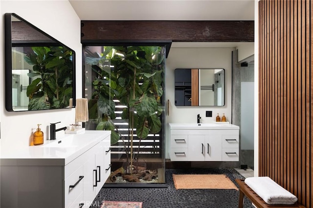 bathroom featuring vanity and beam ceiling