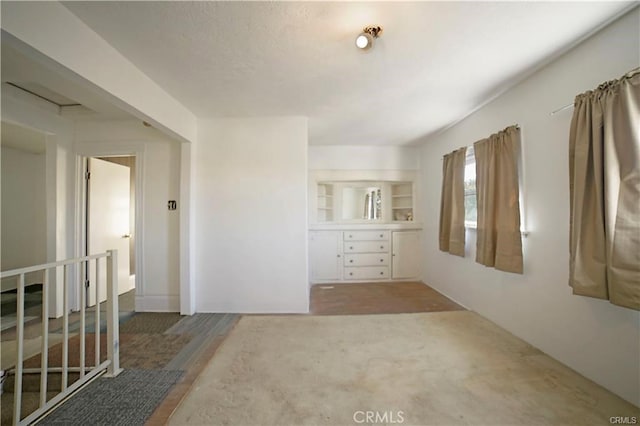 empty room with hardwood / wood-style flooring