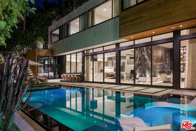 view of swimming pool featuring a patio