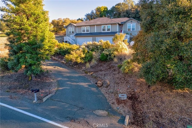 view of front of property with a garage