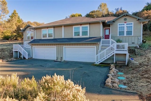 view of front of property with a garage