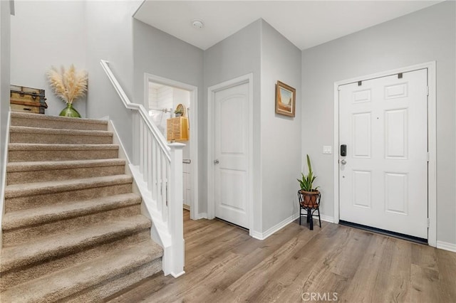 entrance foyer with light hardwood / wood-style floors