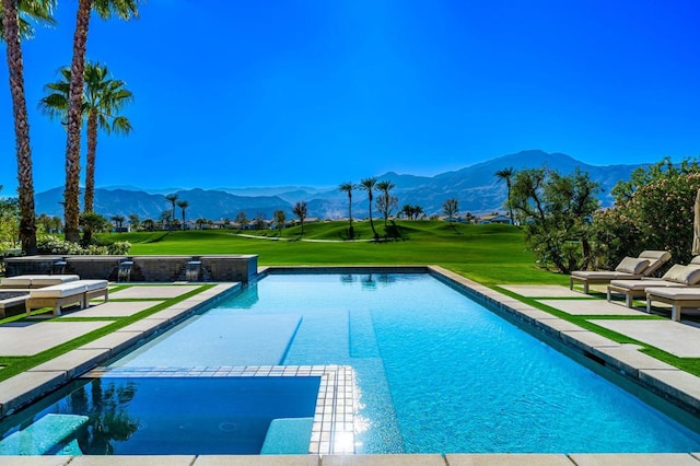 view of pool with a mountain view