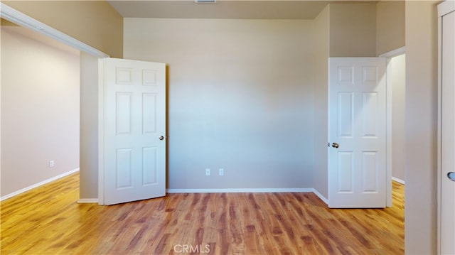 unfurnished bedroom featuring light hardwood / wood-style flooring