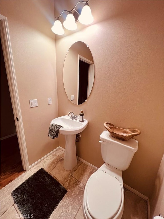 bathroom featuring toilet