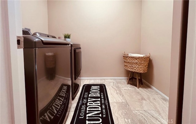 washroom featuring independent washer and dryer