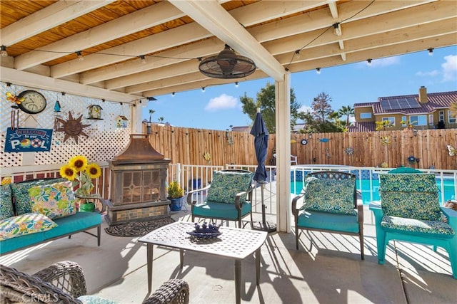 view of patio featuring a fenced in pool