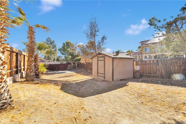 view of yard featuring a storage unit