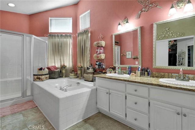 bathroom featuring vanity, tile patterned floors, and independent shower and bath