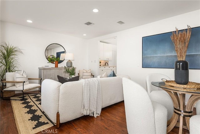 living room with dark wood-type flooring