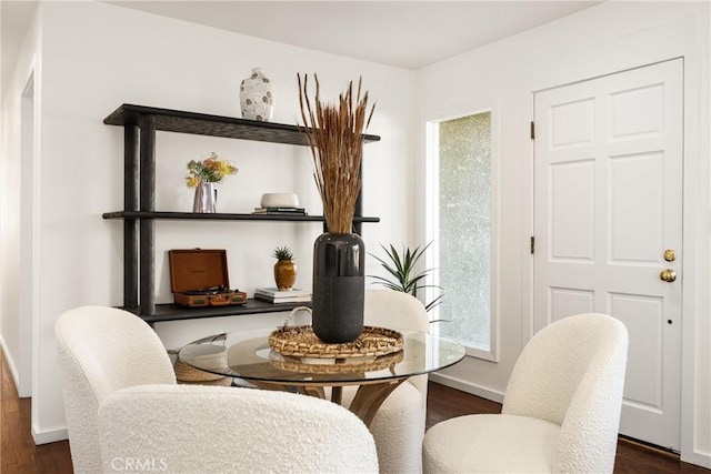 dining area featuring dark hardwood / wood-style flooring