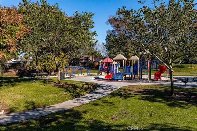 view of play area with a yard