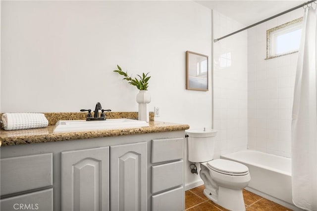 full bathroom featuring tile patterned floors, vanity, shower / bath combination with curtain, and toilet