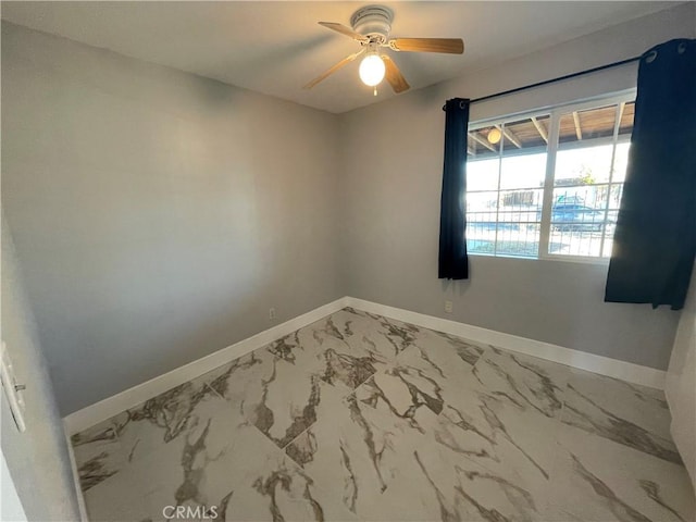 unfurnished room with ceiling fan