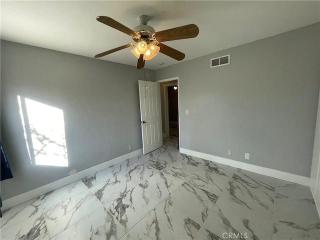 empty room featuring ceiling fan