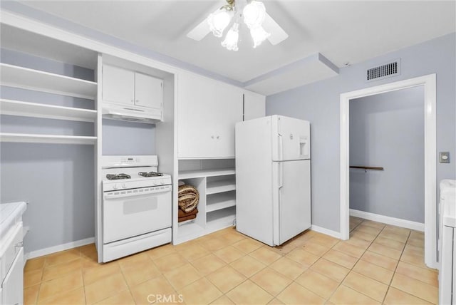 kitchen with white cabinets, light tile patterned floors, white appliances, and ceiling fan