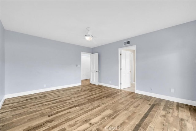 empty room with light wood-type flooring