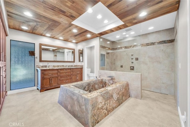 bathroom with vanity, toilet, and wood ceiling