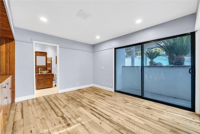 interior space with light hardwood / wood-style flooring