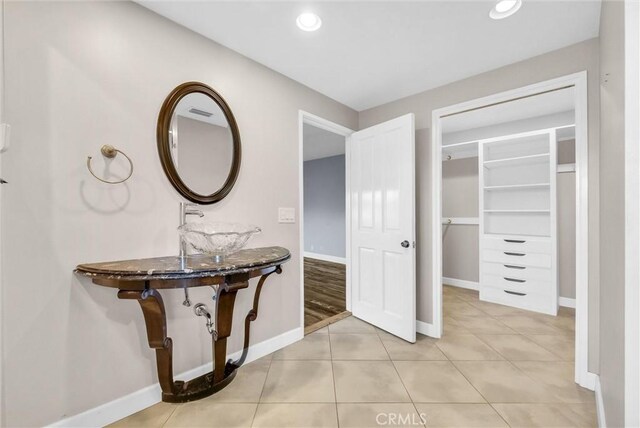 bathroom featuring tile patterned flooring