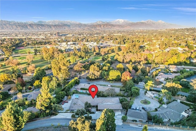 birds eye view of property featuring a mountain view