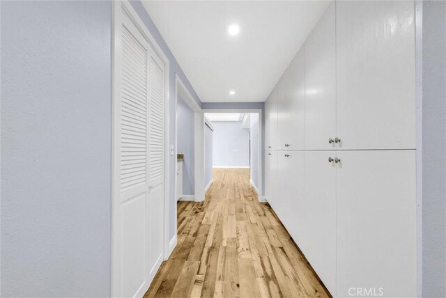 hallway featuring light hardwood / wood-style floors