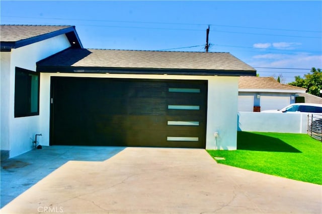 garage with a yard