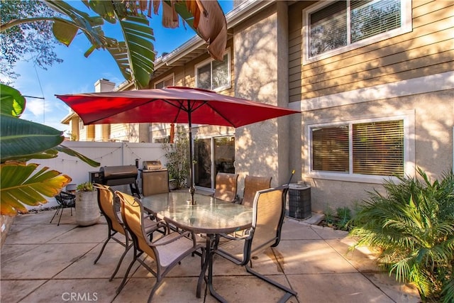 view of patio featuring grilling area and central AC